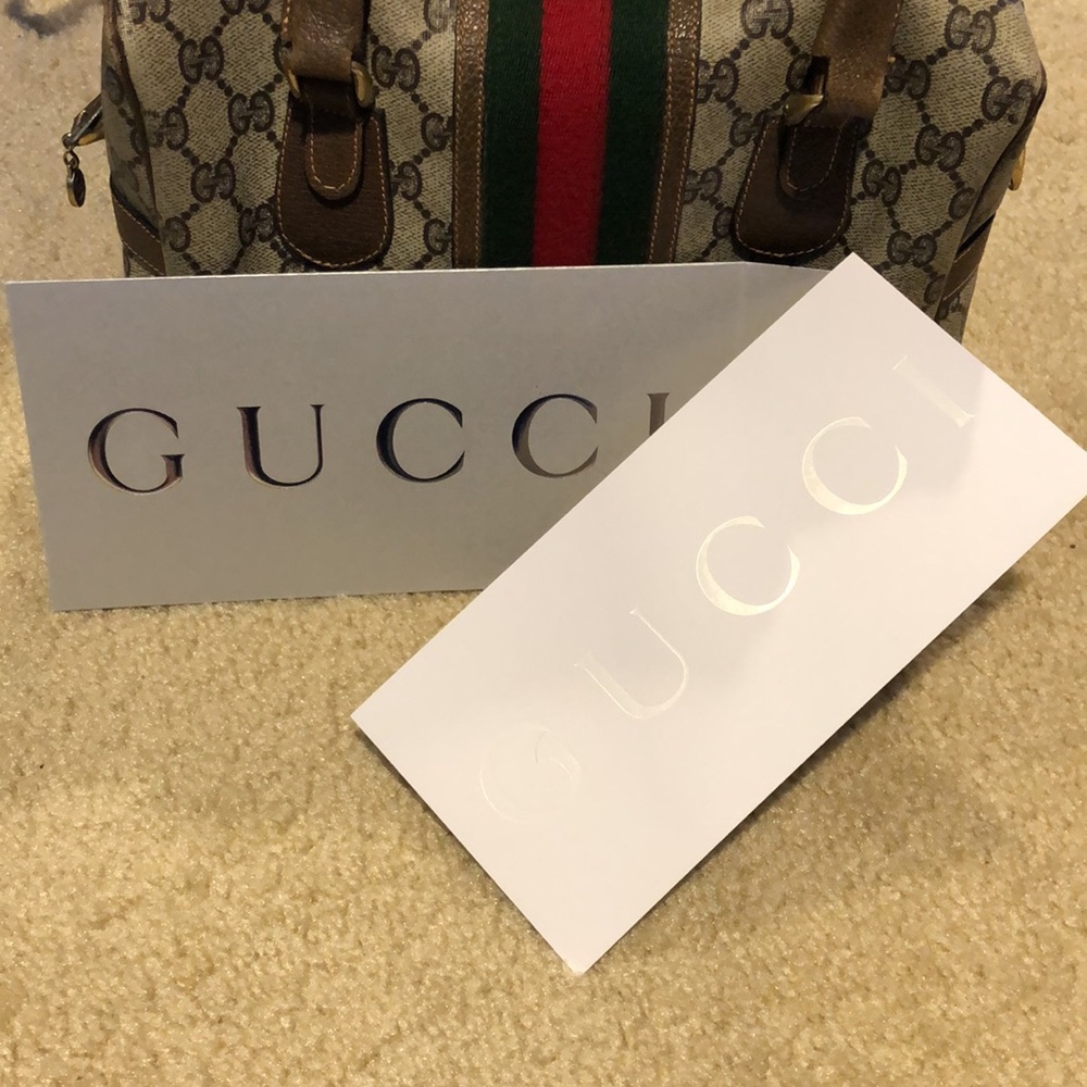 AUTHENTIC GUCCI  silver envelope and insert Gucci card